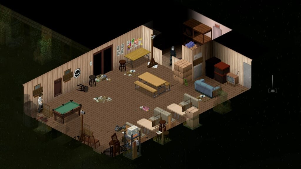 A large living area, with a skull icon poster on the wall, and trash strewn on the ground.