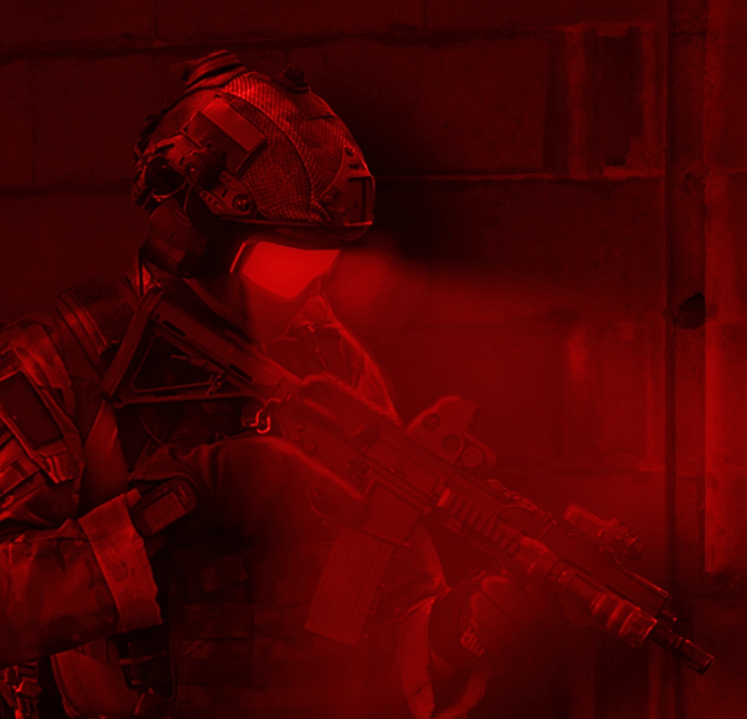 A red-tinted image of a solider in a gas mask, holding an assault rifle